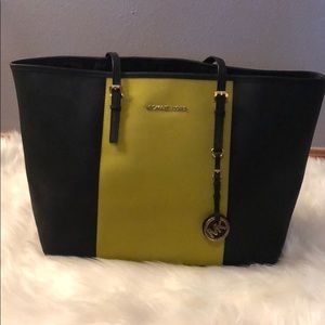 Used Mickel Kors Jet Set Tote black and lime green